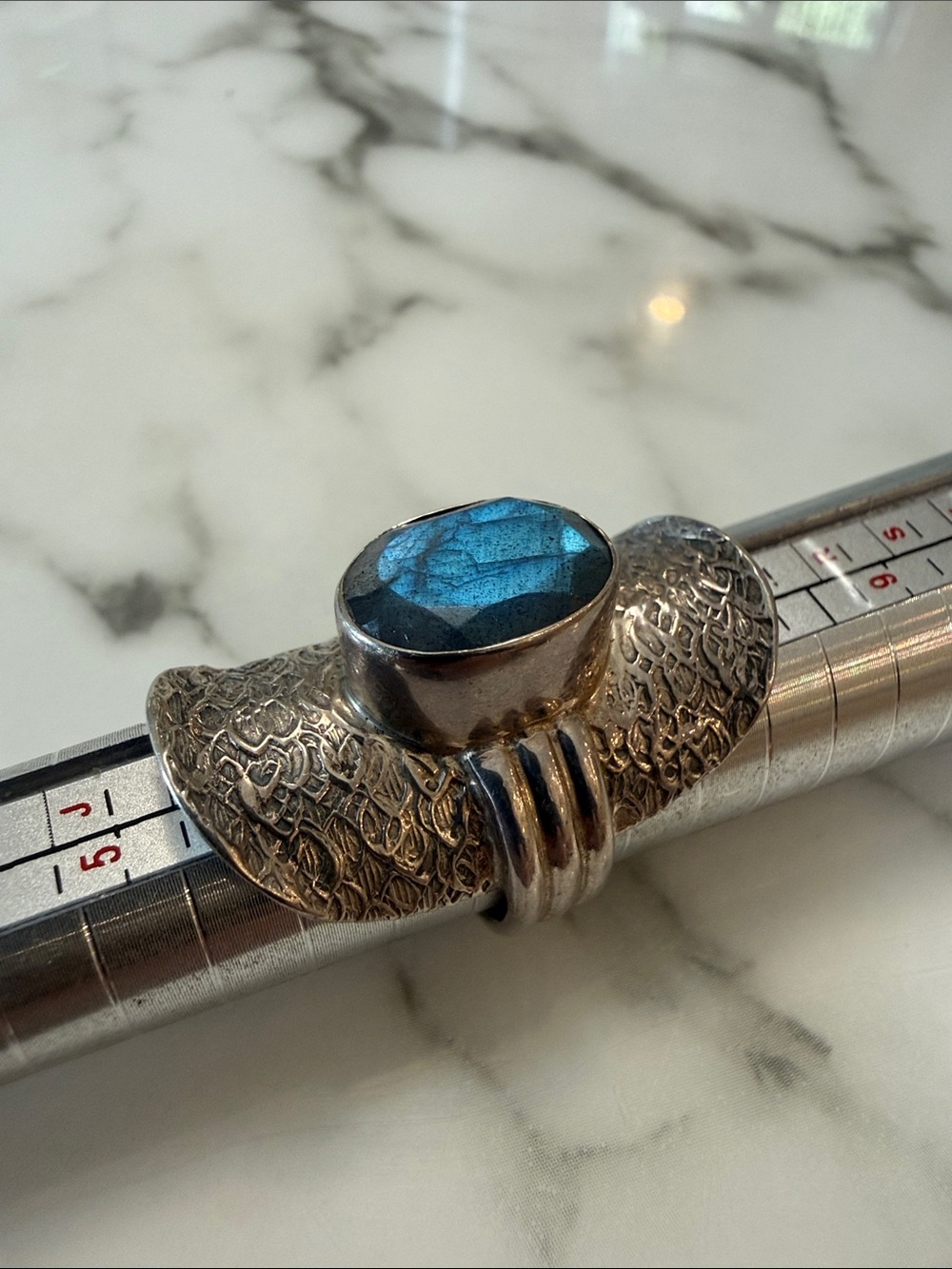 PTI silver platter ring with blue stone, size 7.